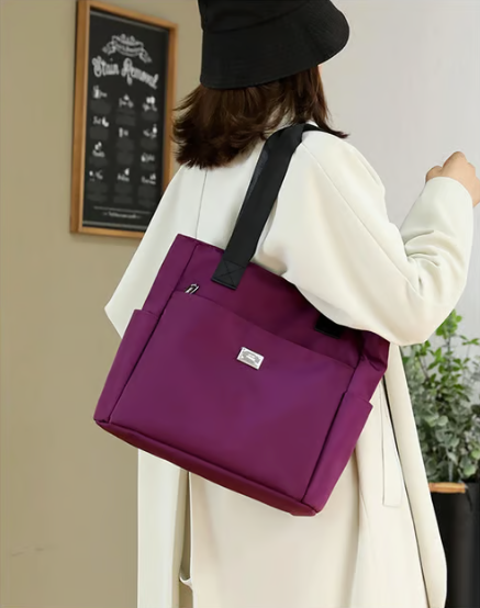 Wasserabweisende Umhängetasche mit mehreren Fächern